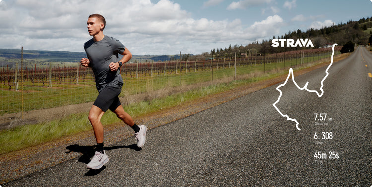 Runner with Amazfit Cheetah 2 Pro and Strava route overlay